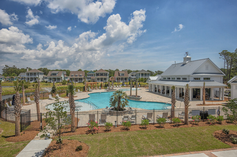 Aerial view of the community clubhouse and pool in Living Dunes