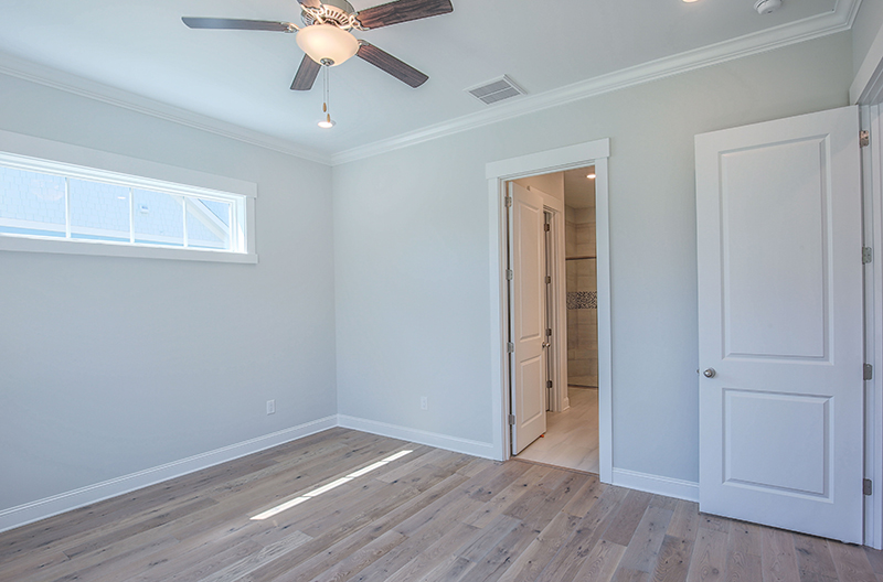 Bright room closet door open bathroom and closet